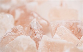 Portion of pink himalayan Salt (detailed close-up shot, selective focus)