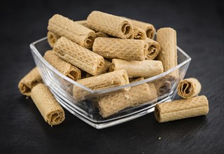 Portion of Wafers as detailed close up shot on a slate slab, selective focus