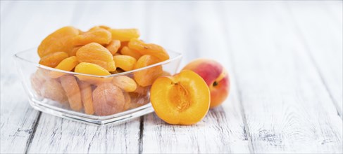 Dried Apricots on a vintage background as detailed close-up shot (selective focus)