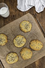 Chocolate Chip Cookies on an old wooden table (selective focus)