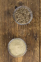 Fresh made White Pepper on a vintage background as detailed close-up shot