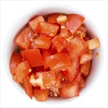 Portion of Diced Tomatoes (as close-up shot) isolated on white background