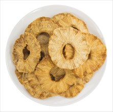 Fresh made Dried Pineapple Rings isolated on white background, close-up shot