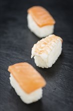 Some fresh made Sushi (detailed close-up shot, selective focus)