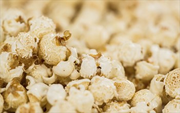 Some homemade Popcorn as detailed close-up shot, selective focus