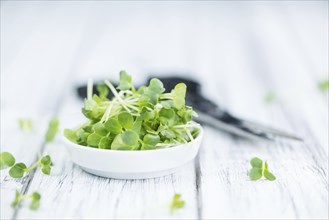 Cutted Cress on a vintage background as detailed close-up shot (selective focus)