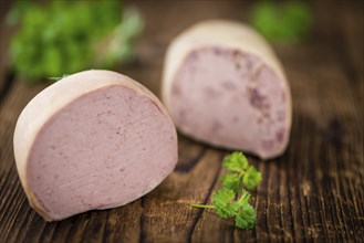 Portion of fresh made Liverwurst (close-up shot, selective focus)