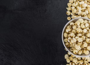 Some Popcorn on a vintage slate slab, selective focus