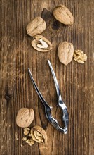 Walnuts on a vintage background as detailed close-up shot (selective focus)