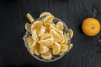 Portion of tangerines (close-up shot) on a vintage background (selective focus)