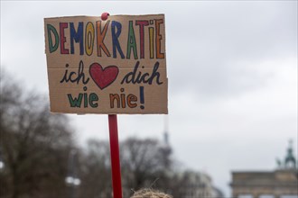 A pro-democracy placard on a road near the Brandenburg Gate on a day of political protest. Berlin,