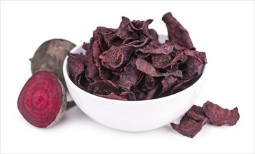 Portion of Beetroot Chips isolated on white background (selective focus)