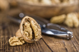 Portion of fresh Walnut kernels (close-up shot, selective focus)