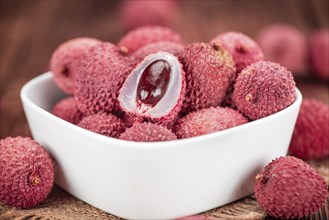 Portion of fresh Lychees (close-up shot, selective focus)