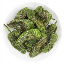 Portion of Pimientos de Padron as detailed close-up shot isolated on white background