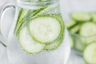 Homemade Cucumber Water on vintage background selective focus, close-up shot