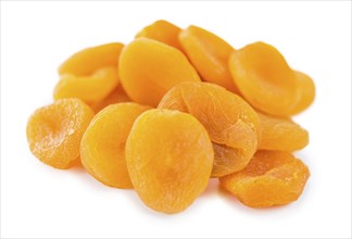 Portion of Dried Apricots (as close-up shot) isolated on white background