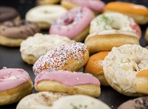 Fresh made Donuts as detailed close-up shots (selective focus)