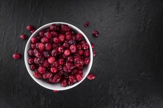 Portion of healthy Dried Cranberries (selective focus, close-up shot)