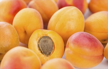 Apricots on a vintage background as detailed close-up shot (selective focus)