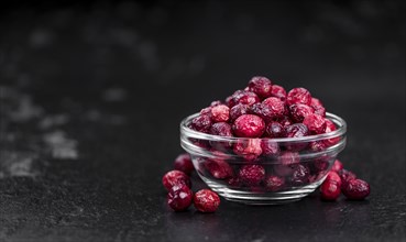 Portion of healthy Dried Cranberries (selective focus, close-up shot)