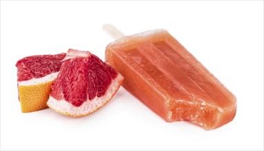 Portion of homemade Grapefruit Popsicles isolated on white background (selective focus)