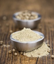 Fresh made White Pepper on a vintage background as detailed close-up shot