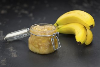 Mashed Bananas (selective focus, close-up shot) on a vintage background