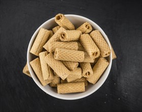 Portion of Wafers as detailed close up shot on a slate slab, selective focus