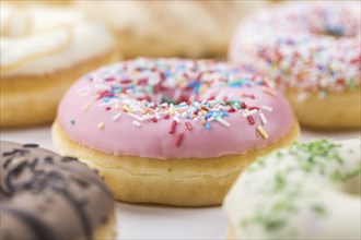 Fresh made Donuts as detailed close-up shots (selective focus)