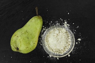 Portion of Pear powder as detailed close-up shot, selective focus