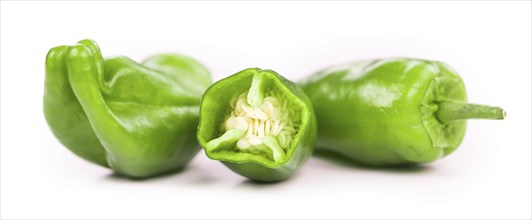 Portion of Raw Pimientos as detailed close-up shot isolated on white background