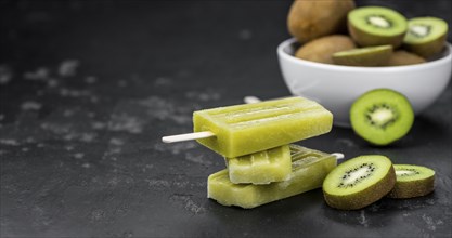 Kiwi Popsicles (fresh) as detailed close-up shot, selective focus)