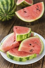 Portion of fresh Watermelon (close-up shot, selective focus)