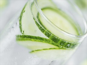 Cucumber Water on a vintage background as detailed close-up shot, selective focus