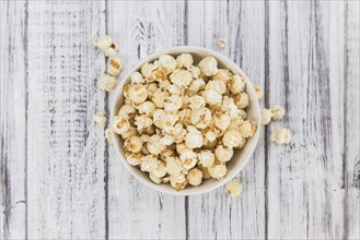 Some homemade Popcorn as detailed close-up shot, selective focus