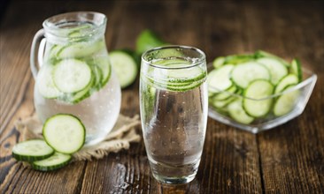 Homemade Cucumber Water on vintage background selective focus, close-up shot