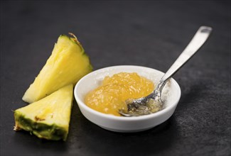 Some homemade Pineapple Jam as detailed close-up shot, selective focus