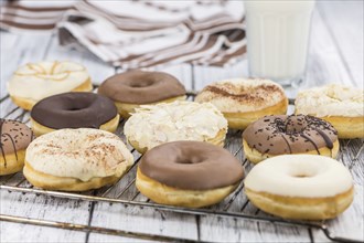 Portion of some Donuts as detailed close-up shot (fresh made, selective focus)