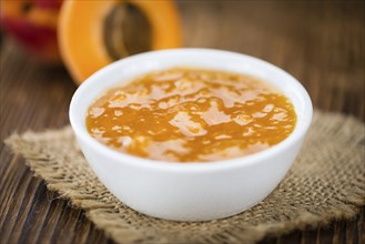 Some homemade Apricot Jam (selective focus) as detailed close-up shot