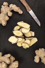 Slate slab with Ginger Slices (selective focus, close-up shot)