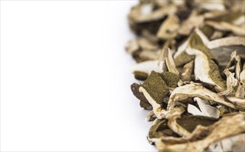 Portion of Dried Porcinis as detailed close-up shot isolated on white background