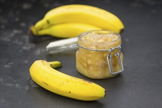 Mashed Bananas (selective focus, close-up shot) on a vintage background