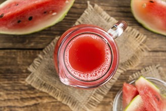 Watermelon Smoothie on a vintage background as detailed close-up shot (selective focus)