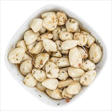 Marinated Garlic isolated on white background (selective focus, close-up shot)