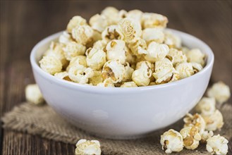 Some homemade Popcorn as detailed close-up shot, selective focus