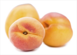 Apricots isolated on white background (selective focus, close-up shot)