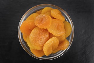 Portion of fresh Dried Apricots (close-up shot, selective focus)