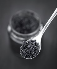 Caviar on a vintage looking slate slab (selective focus)