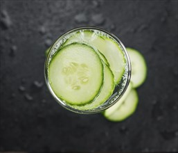 Cucumber Water on a vintage background as detailed close-up shot, selective focus